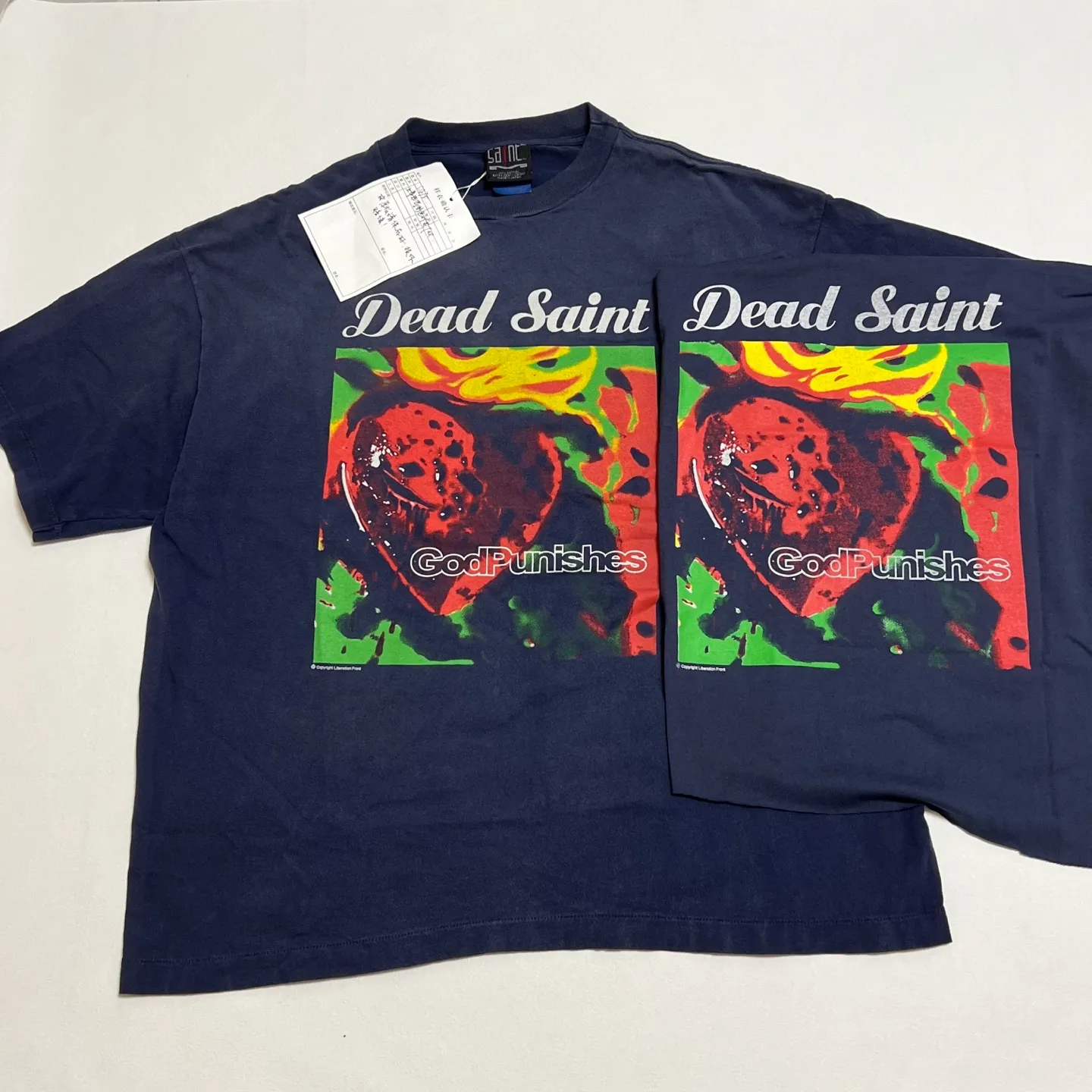 Printing proofing comparison SAINT Mxxxxxx DEAD SAINT SS TEE/NAVY DEAD SAINT printed short sleeves God's punishment TEE Washed blue S-XL Genuine consistent tube weaving without side seams High weight OE yarn fabric Assute dyeing Multiple horse fades Heavy wash water Worn holes Original consistent main mark/wash mark/little angel anti-counterfeiting mark